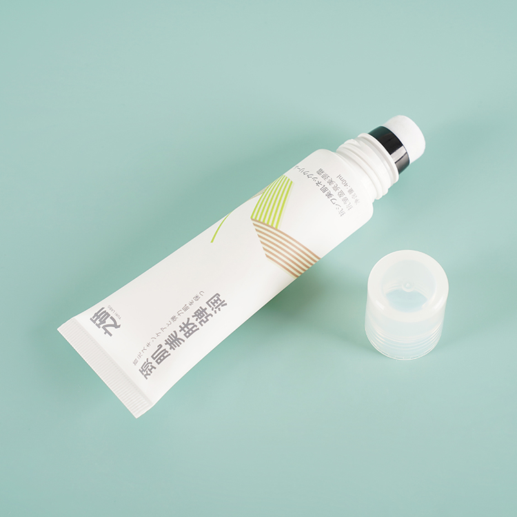 Tubo de envase de plástico cosmético con cabezal aplicador flocado