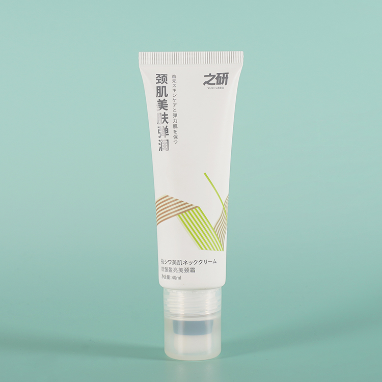 Tubo de envase de plástico cosmético con cabezal aplicador flocado