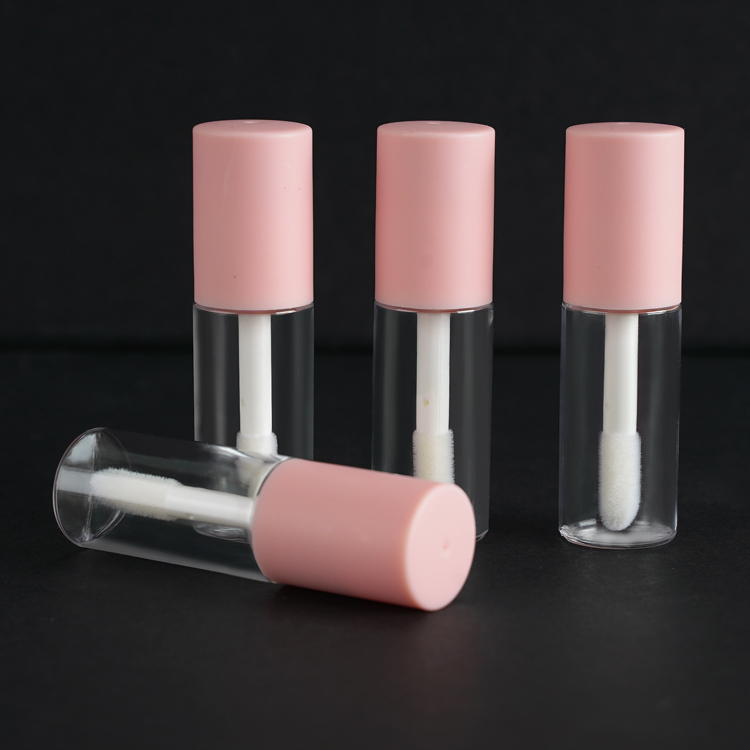 Tubos de brillo de labios rosa, blanco y negro Tubos de brillo de labios con cabezal de cepillo