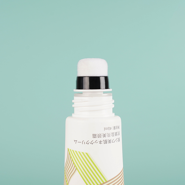 Tubo de envase de plástico cosmético con cabezal aplicador flocado