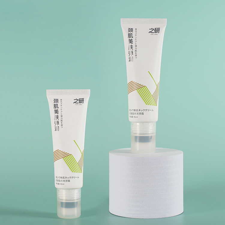 Tubo de envase de plástico cosmético con cabezal aplicador flocado